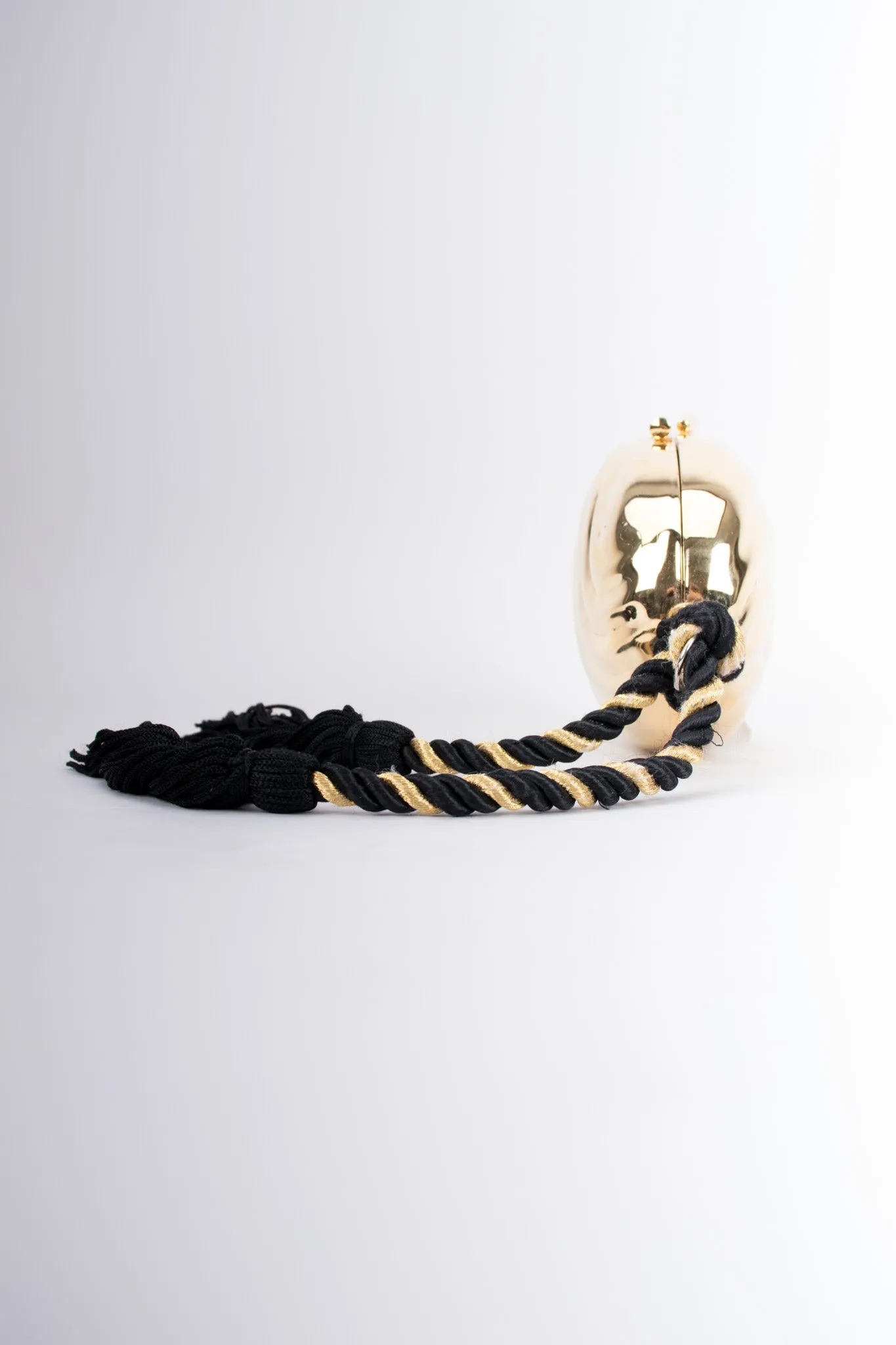 Golden Egg Tassel Clutch