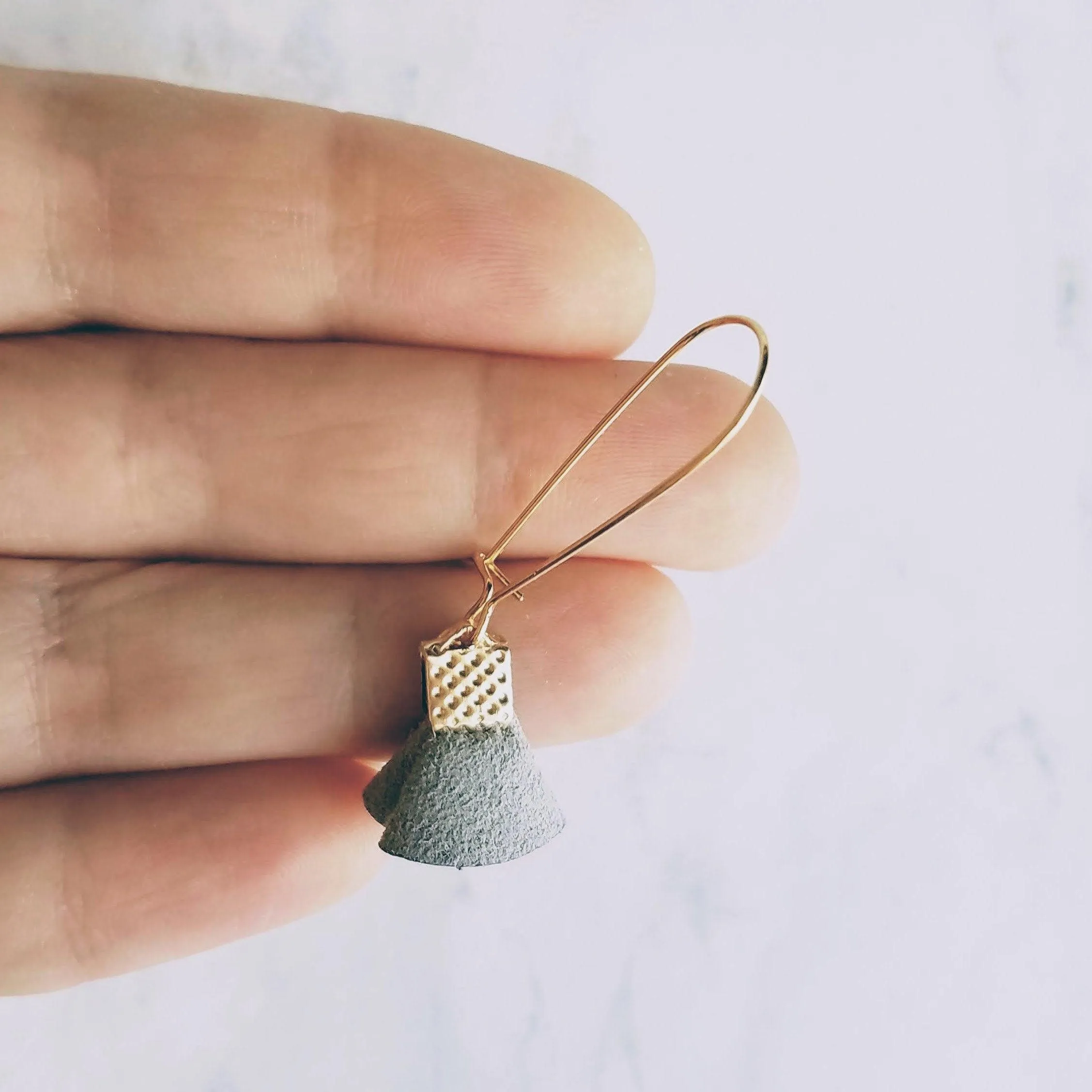 Grey Tassel Earrings - tiny faux suede folded fabric on long latching kidney ear hooks, gray vegan leather, small fan shape, little dangle